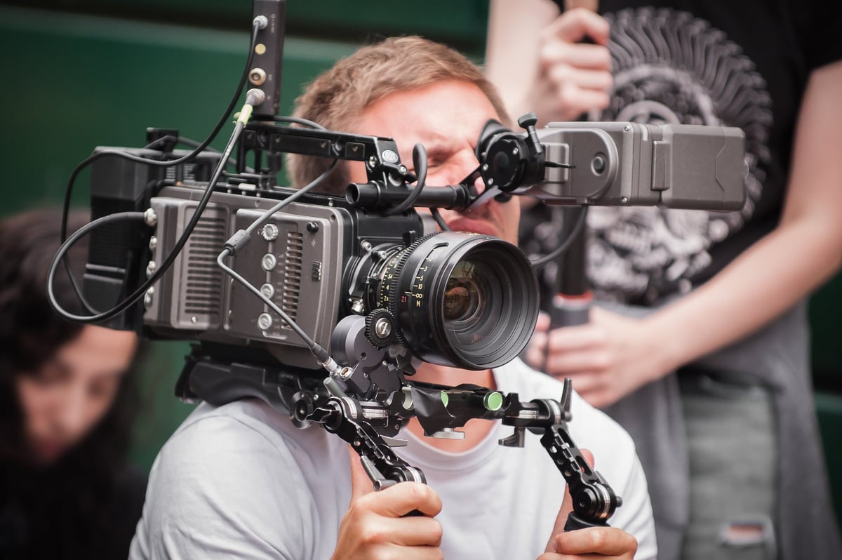 Documentary cinematographer filming on location in Japan